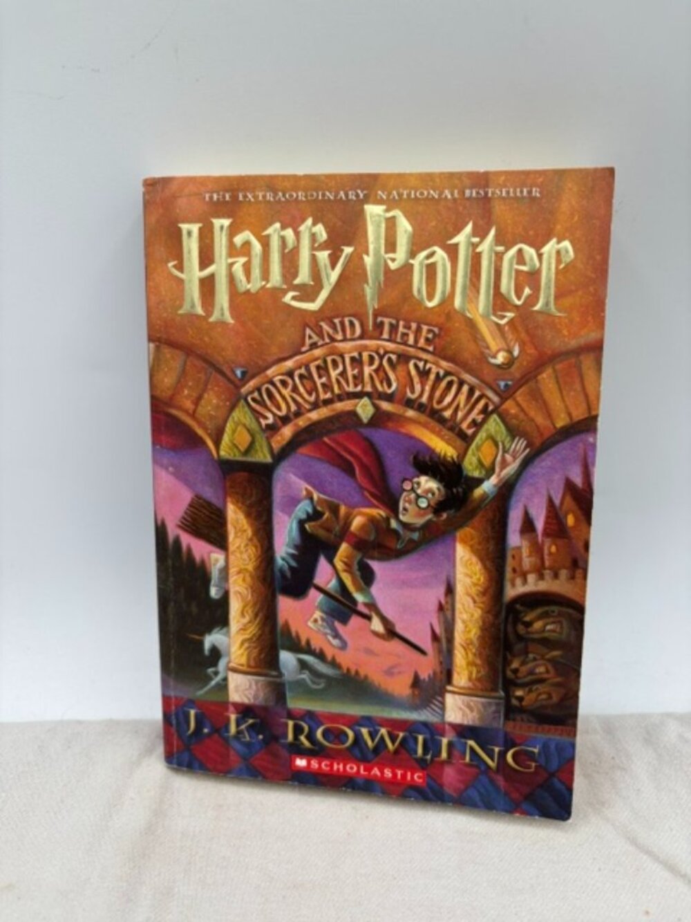 Harry Potter and the Sorcerer's Stone by J. K. Rowling (1999, Mass Market).